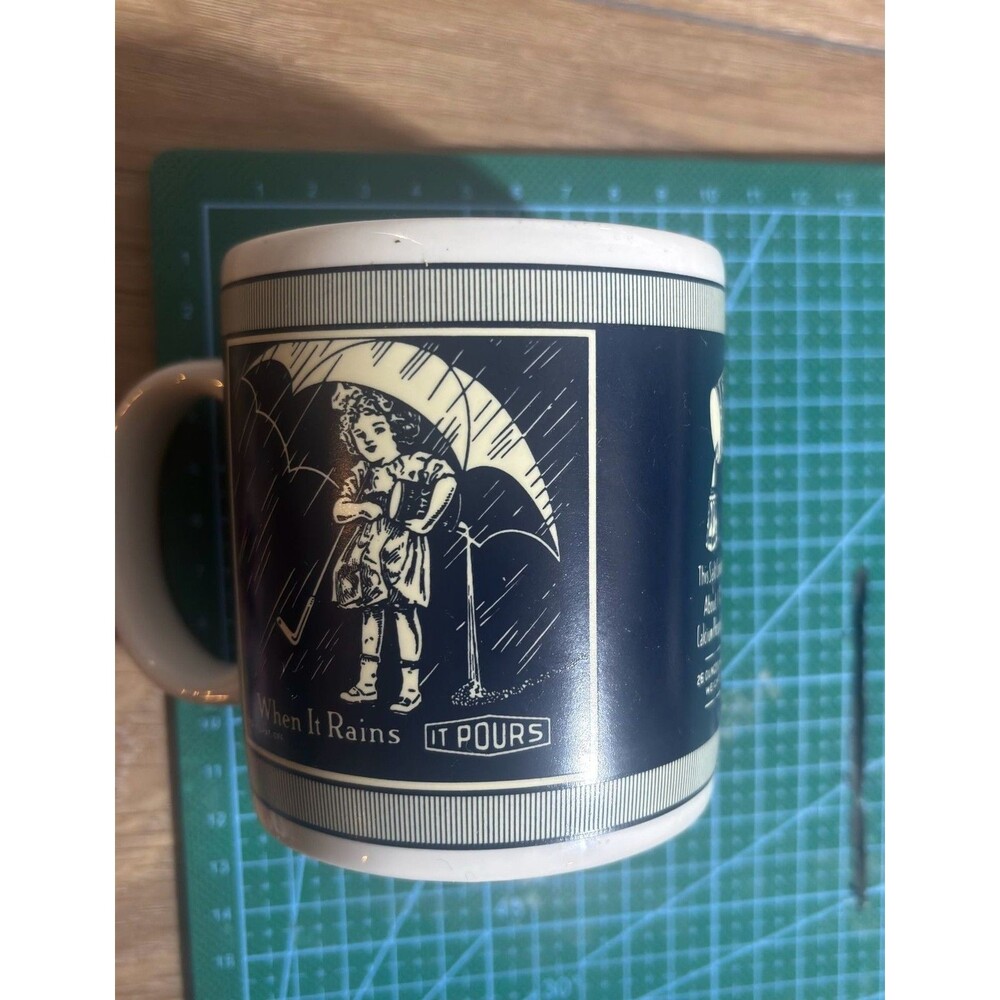 Vintage Morton Salt Ceramic Coffee Mug When It Rains It Pours Blue and White